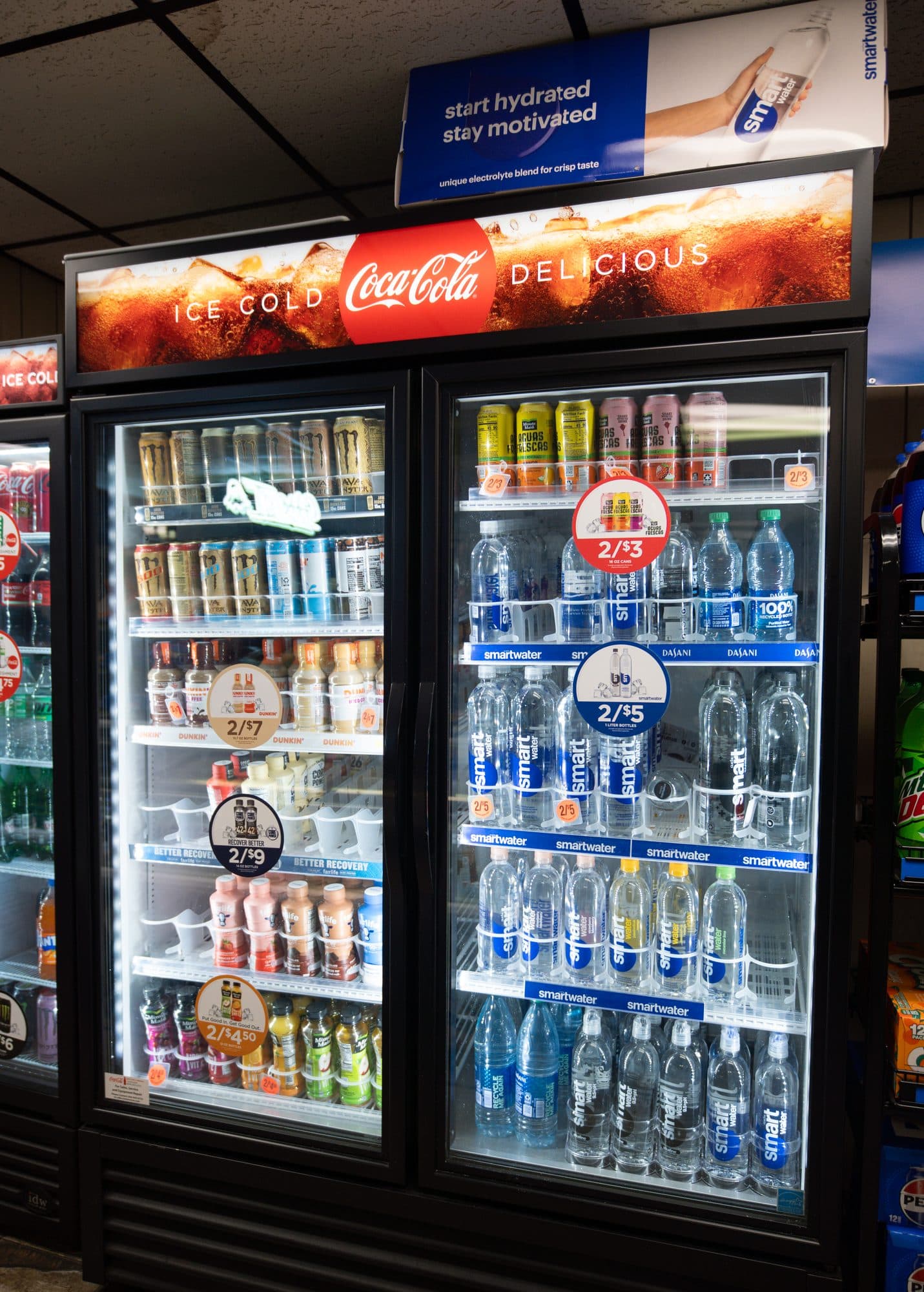 Coolers stocked with soda and water